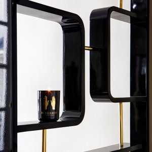 Black lacquered wood and brass screen wall by Red Edition at Woodely
