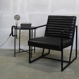 Tender black leather armchair